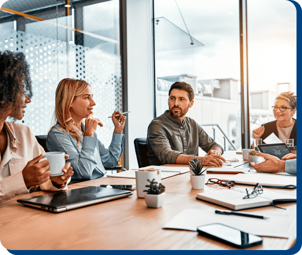 Business team meeting around table.